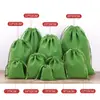 Bolsa de franela directa de fábrica con cordón de brocado, bolsa para embalaje de joyería, bolsa de tela pequeña para teléfono móvil y batería portátil