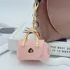 Colgante Llavero Mini Bolso de Cuero, Accesorio de Moda de Alta Gama para Bolso, Accesorio Creativo para Niñas, Puede Guardar Auriculares