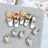Accesorios de arte para uñas estilo lujo ligero nuevos adornos de diamantes súper brillantes de alta calidad circonita cilíndrica súper brillante adornos de diamante ponibles para uñas al por mayor