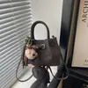 Bolso Cubo de Gama Alta de Moda para Mujer Bolso Versátil 2026 Nuevo Bolso Casual para el Trabajo Bolso de Hombro Individual Cruzado