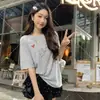 Carta de Amor de VeranoCamiseta casual relajada con estampado de corazón y letra, cuello redondo, manga corta, top estilizado y versátil