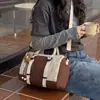 Nueva bolsa de viaje de moda de comercio exterior, gran capacidad, diseño moderno y minimalista, adecuada para viajes cortos, viajes de negocios y uso en el gimnasio, se puede llevar en la mano o usar como bolsa cruzada