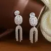 Pendientes Elegantes de Lujo con Pinza para Espiral de Mosquitos para Mujeres Sin Perforaciones Moda Pendientes de Botón con Borla de Circonita y Perla