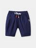 Comercio exterior transfronterizo verano nuevo bebé color sólido pantalones cortos decoración de cordón falso moda niños pantalones cortos casuales venta al por mayor