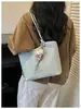 Bolso tote de mimbre tejido a mano retro de nicho para mujer, nuevo y moderno 2026 de gran capacidad para el trabajo y los desplazamientos, bolso de hombro de moda