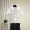 Camisa Blanca Transfronteriza Europea y Americana de Amazon Juvenil y Rejuvenecedora con Figuras Bordadas de Colores, Corte Holgado, Top para el Trayecto Diario