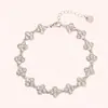 Pulseira de Trevo de Quatro Folhas com Pedras Totais de Alta Versão Moda Transfronteiriça para Meninas, Luxo Acessível e Pulseira de Flor de Aço Titânio Estilo Ins de Alta Qualidade