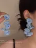 Brincos florais com franjas transparentes para meninas, novos brincos estilo férias na praia 2025, modernos e exagerados, fazem o rosto parecer menor