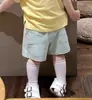 Novo Conjunto de Roupas Infantis Estilo Coreano para Meninos e Meninas, Camiseta Fofa de Manga Curta com Gola Polo e Shorts Listrados Conjunto de Duas Peças