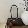 Bolsa Pequena Retrô de Alto Nível para Comércio Exterior para Mulheres 2025 Nova Bolsa Versátil de Ombro Axila Bolsa de Mão da Moda Bolsa Balde