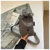 Bolsa de pecho ligera con cordón modelo nuevo verano 2026 bolsa cruzada compacta multifuncional para mujer bolsa versátil para teléfono bolsa de tela de un solo hombro