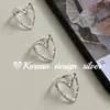 Blogger de Corea del Sur estilo ins con anillo de amor hueco con textura S925 plata de ley para usar apilado todo partido para mujer