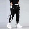 Monos de moda nacionales de primavera y verano para hombre, pantalones con cordón y costuras para niños, pantalones casuales holgados de marca de moda de hip-hop, pantalones delgados