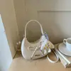 Bolso de Mano Femenino de Lujo Ligero de Nicho Transfronterizo Nuevo Estilo Otoño 2026 Bolso de Moda para el Trabajo Bolso de Media Luna Bolso de Hombro Cruzado