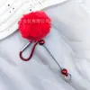 Hebilla de montañismo con cuentas de bola de pelo DIY producto cálido de invierno llavero accesorios de pelo de once colores colgante se puede empaquetar en nombre de pelo