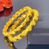 Pulsera de Aleación Chapada en Oro de Venta Caliente Novia de Dubái India Lujo Ligero para Mujer Boda Oro Arena Pulsera Joyería Al por Mayor
