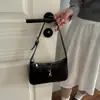 Este año, los bolsos pequeños de diseño de nicho están de moda para las mujeres.. Aquí están los nuevos estilos 2026: bolsos bandolera versátiles, bolsos de hombro a la moda y bolsos de axila