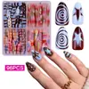 Conjunto de 96 peças de unhas postiças autoadesivas removíveis com listras em cores contrastantes e bolinhas em estilo europeu e americano