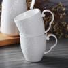 Taza de café de cerámica con diseño de mariposa en relieve de estilo europeo, de porcelana china, regalo creativo, taza de desayuno con logotipo incluido.