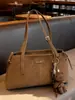 Bolso de Hombro de Moda Transfronterizo de Comercio Exterior de Gran Capacidad para Mujer 2025 Nuevo Bolso Tote tipo Satchel Retro de Gama Alta para el Trabajo y los Viajes
