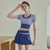 Terno transfronteiriço Color-block feminino corrida fitness respirável secagem rápida bolso lateral anti-corrida falso duas peças shorts de ioga