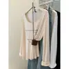 Camiseta fina de manga longa semi-transparente de alta qualidade estilo coreano para mulheres, versão coreana de verão, peça de sobrepor solta para ambientes com ar condicionado