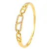Pulsera Ovalada de Cobre Chapado en Oro de 18 Quilates con Circonia y Broche Hueco, Estilo Único para Mujer, Lujo Ligero y Sensación de Alta Gama