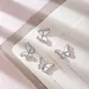 Nuevos accesorios para uñas de primavera lujo ligero súper brillante circonita mariposa tridimensional decoración de uñas con diamantes accesorios para uñas para llevar