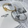 Bracelete brincos anel assimétricos simples Arco do Triunfo dourado e prateado 2023 novo bracelete luxo leve nicho bracelete requintado
