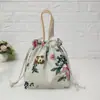 Suministro directo de fábrica bolsa portátil con cordón bolsa de lona portátil monedero para teléfono móvil bolsa pequeña de dibujos animados para mujer bolsa para la compra de mamá