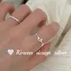 Popular joyería de plata brillante de Dongdaemun, Corea del Sur: Anillo de plata de ley S925 hueco de luna y estrella, pequeño y lindo, adecuado para apilar