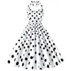 C Sourcing transfronteiriço vestido retrô estilo Hepburn dos anos 50/60 com gola halter, poá, modelagem que afina e saia godê