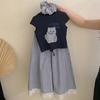 Traje de camiseta de manga corta estampada para niña Verano 2025 Ropa de verano nueva para niños Pantalones de cuadros con encaje para niña Conjunto de dos piezas