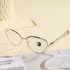 Gafas de alambre dorado estilo ojo de gato de alta gama refinado pícaro montura metálica anti-luz azul monturas de gafas retro europeas y americanas para mujer