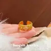 Nuevo anillo de trébol de encaje estilo chino Buccellati para mujer, con una elegancia de estilo nacional, lujo ligero de nicho y una sensación de alta gama, con un diseño abierto