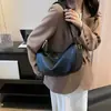 La bolsa popular de este año bolso bandolera de otoño 2023 nuevo vintage color sólido bolsa de albóndiga moda bolso de hombro bajo el brazo