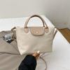 Bolso Minimalista de Bloques de Color Xiaolongxiang para Mujer 2025 Nuevo Primavera y Verano Versátil Nicho Bolso Dumpling Moda Bolso de Hombro Texturizado