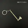 8cm Notas de Tomb Raider Pala de Luoyang Piolet Hacha Pala Modelo de Metal Gadget de Aleación Adorno Llavero