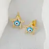 Pendientes Europeos y Americanos Transfronterizos Explosivos Chapados en Oro Cobre Circonita Ojo del Diablo Pendientes de Diseño de Estrella de Cinco Puntas de Nicho de Moda