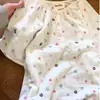 Pijama dulce y lindo con estampado colorido para niñas, estilo coreano de verano, estilo ins, holgado, de manga corta, adecuado para usar afuera