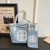 Bolsa Tote de Ombro com Estampa de Letras de Grande Capacidade 2025 Nova Tendência Simples Casual Texturizada para o Dia a Dia Conjunto de Duas Peças