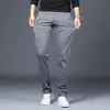 Pantalones Casuales Blancos de Algodón Puro de Lujo Ligero para Hombre de Verano, Estilo Coreano Modernos Rectos Delgados Largos, Nuevo Modelo 2026