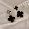 Pendientes de trébol de cuatro hojas de moda simple transfronterizos para mujer, pendientes de encaje con temperamento, pendientes de ambiente para mujer, joyería en stock, venta al por mayor
