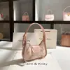 Uma geração de bolsa pequena bordada para axila outono e inverno 2025 nova bolsa de alta qualidade borboleta crescente atacado