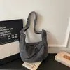 Bolso de mezclilla transfronterizo para mujer, bolso tipo dumpling, nuevo bolso cruzado grande de verano 2026 para estudiantes para la escuela