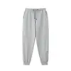 Pantalones de chándal de primavera y otoño para hombre y mujer, cordón de algodón ligero, color liso, estilo europeo y americano, holgados, pantalones de chándal Kuyuanwai