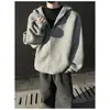 Suéter cárdigan con capucha de color liso estilo americano Otoño/Invierno 2025 Nuevo tejido de punto holgado vintage para hombres y mujeres