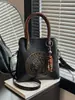 Bolso de Mano de Estilo Étnico Transfronterizo de Nicho Retro para Mujer 2026 Nuevo Bolso Cubo de Textura de Alta Calidad Bolso de Hombro Cruzado