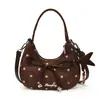 Exquisito bolso de lunares de nicho para mujer, nuevo bolso cruzado versátil de moda 2026, bolso de mano elegante de alta gama