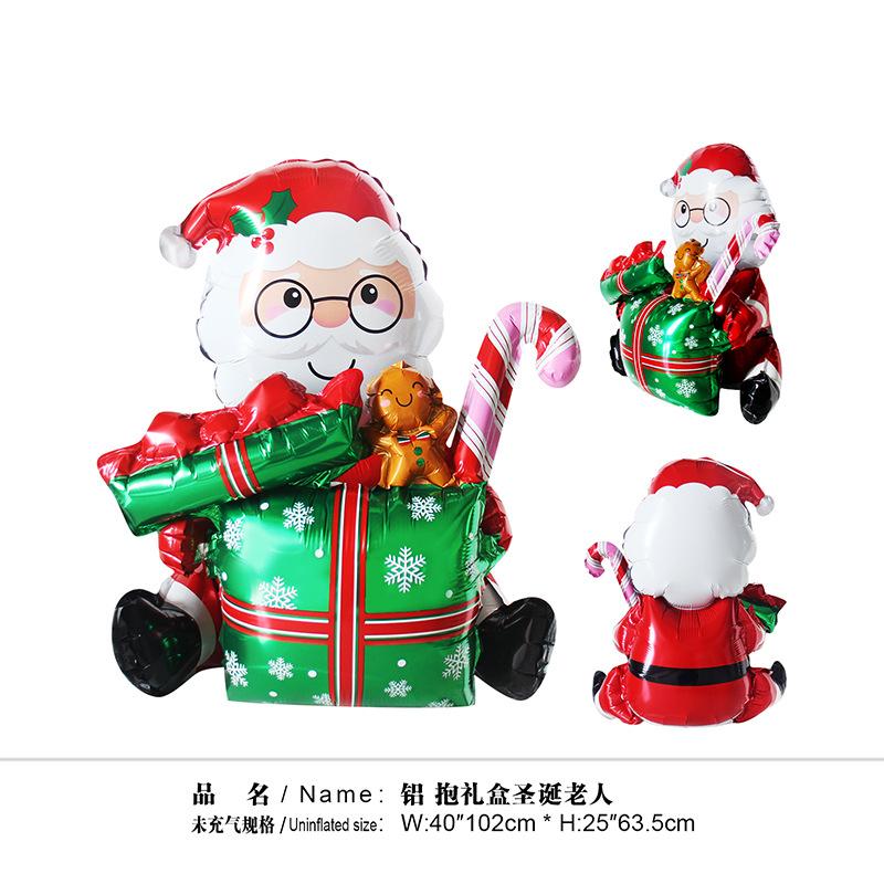 72抱礼盒圣诞老人绿色
